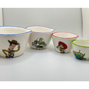 TOY STORY RAE DUNN DISNEYS TOY STORY MEASURING CUPS